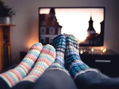 Snuggle up and escape the house with a travel film.