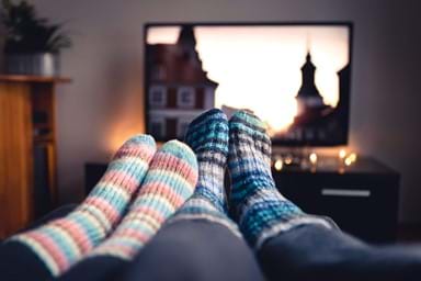 Snuggle up and escape the house with a travel film.
