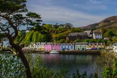 The colourful buildings in the harbour of Portree town on the Isle Of Skye.