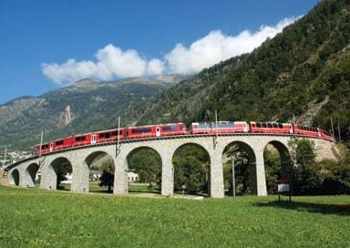 The Bernina Express crosses the famous Brusio Circular Viaduct.