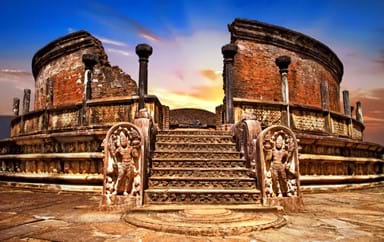 Ancient temples of Polonnaruwa over sunset